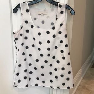 Loft white sleeveless blouse.